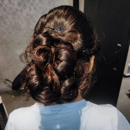 Elegant updo hairstyle for party and reception looks