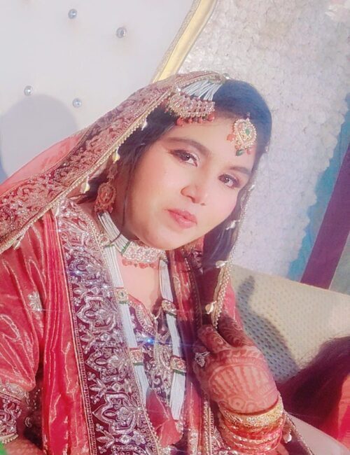 Bridal dupatta draping with elegant styling