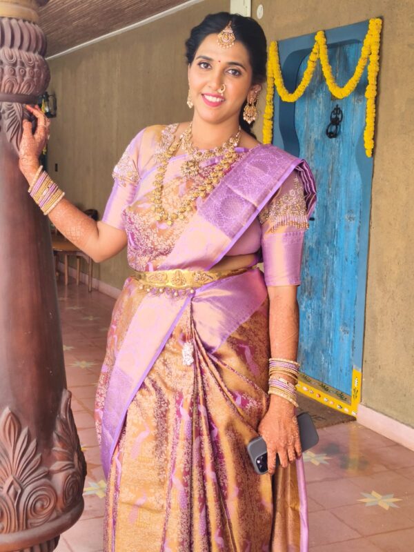 Best Makeup Artist in Hyderabad doing traditional makeup with saree draping