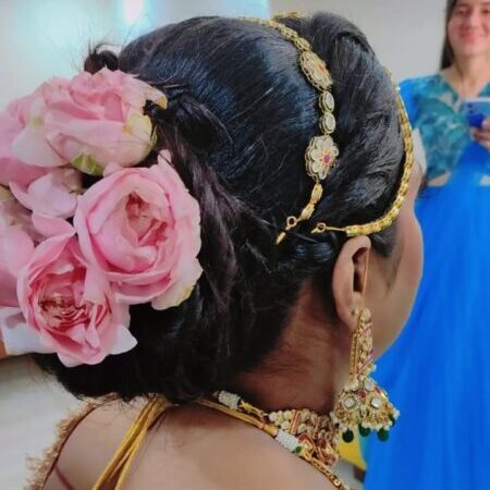 Classic bun hairstyle for bridal and traditional looks